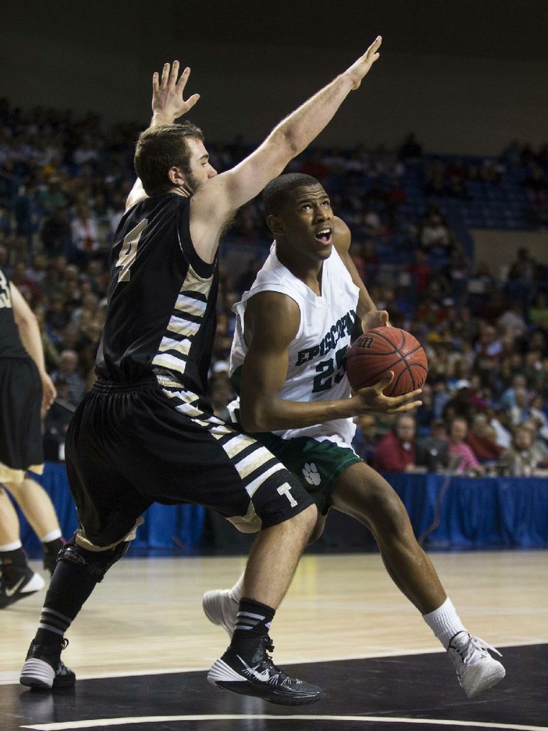 
ARKANSAS DEMOCRAT GAZETTE/MELISSA SUE GERRITS 03/14/2014 -Episcopal's Justin Gooseberry eyes the basket while Charleston's Ty Storey reaches to block his shot during their 3A championship game March 15, 2014 in Hot Springs. 