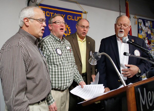 Quartet members Bill Burrows (left to right), John Harrell, Larry Long and Ray Boudreaux sing during the opening activities of the Rotary Club of Fayetteville weekly luncheon Thursday March 13, 2014 at Mermaids restaurant in Fayetteville. The Rotary Club averages about 150 members and guest during their regular meeting.