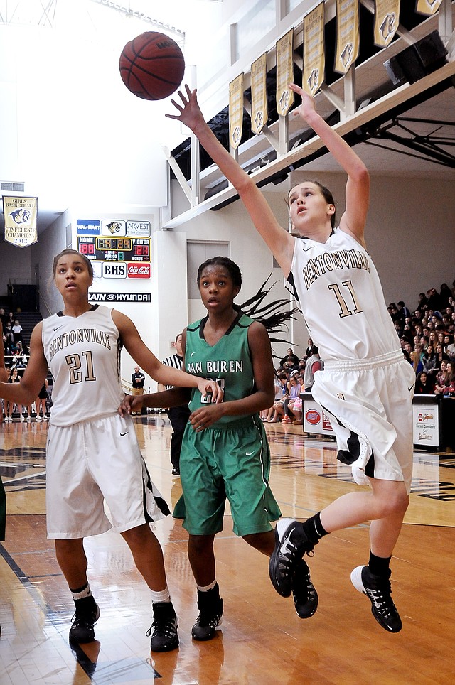 STAFF PHOTO BEN GOFF • Lauren Hargus (right), the lone freshman on Bentonville's basketball team, played a role in the Lady Tigers' late resurgence when she scored a season-high 18 points in a Feb. 7 game against Van Buren and helped Bentonville snap a four-game losing skid.