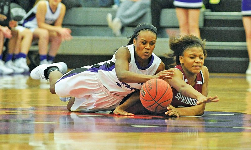 File Photo Michael Woods Alexa Howard, left, of Fayetteville and Springdale High's Chasidee Owens scramble after a loose ball Jan. 4 in Fayetteville. Howard is one of six seniors Fayetteville must replace next season.