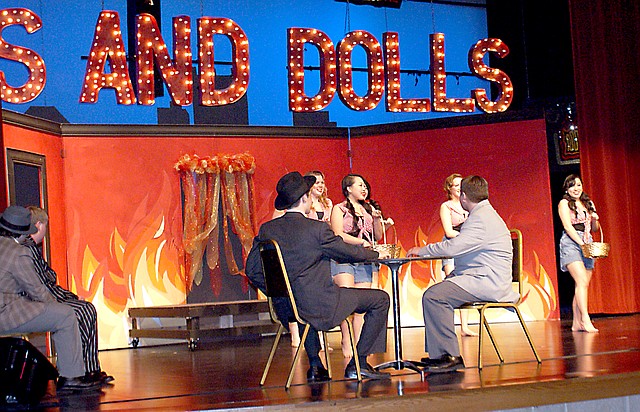 Photo by Dodie Evans Music and dance abounded in the production of &#8220;Guys and Dolls,&#8221; as this scene with the Hot Shot Girls demonstrates. The show was presented in the Gravette High School Performing Arts Center over the weekend.