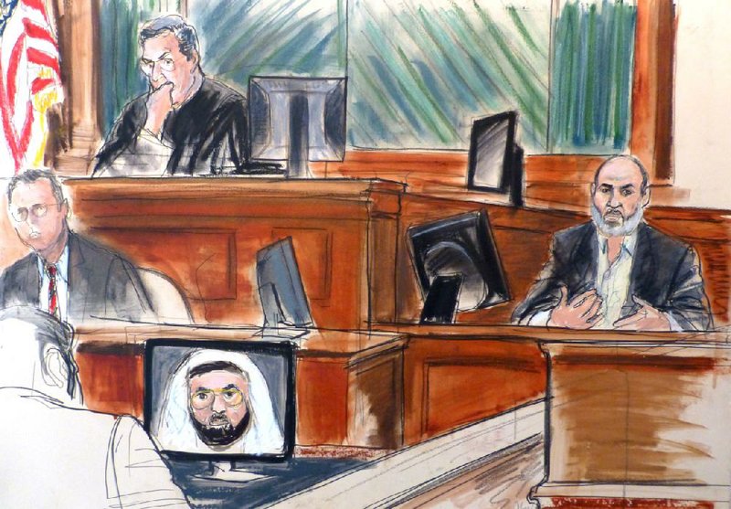 Sulaiman Abu Ghaith (right) testifies at his trial in this courtroom sketch Wednesday in New York as an image of Khalid Shaikh Mohammed, the self-professed architect of the Sept. 11, 2011, attacks, is shown on a video monitor. 
