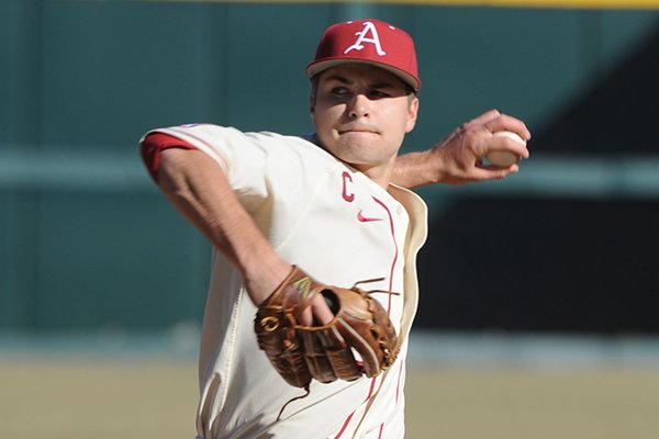 Arkansas junior pitcher Jalen Beeks delivers a pitch against Eastern Illinois during the first inning Friday, Feb. 21, 2014, at Baum Stadium in Fayetteville.