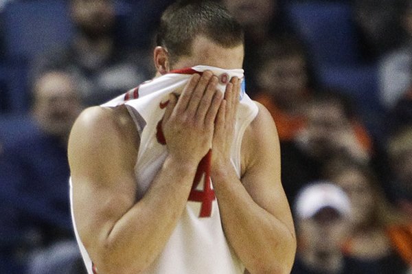 Ohio State's Aaron Craft (4) reacts after a call during the second half of a second-round game against Dayton in the NCAA college basketball tournament in Buffalo, N.Y., Thursday, March 20, 2014. Dayton won the game 60-59. (AP Photo/Bill Wippert)