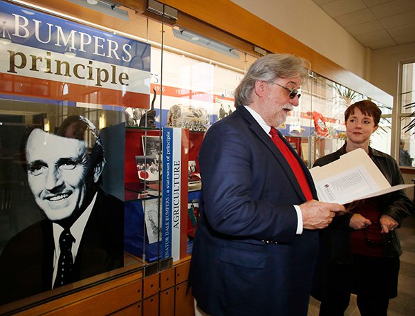 NWA Media/DAVID GOTTSCHALK 
Archie Schaffer (left), nephew of Arkansas’ former U.S. Sen. Dale Bumpers, reviews his notes Wednesday with Melinda Acoach, wife of Bumpers’ great-nephew John Acoach, during a reception before the opening of the Dale Bumpers Senatorial Papers in the Mullins Library on the campus of the University of Arkansas at Fayetteville.