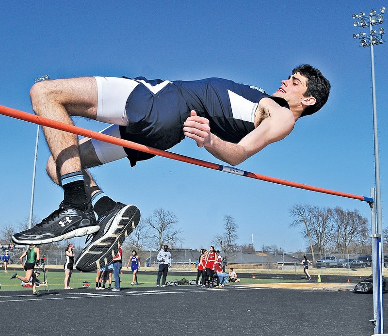  STAFF PHOTO BEN GOFF Springdale Har-Ber&#8217;s Brandon Buccheri clears the bar at a height of 5&#8217; 8&#8221; in the high jump Thursday during Bentonville&#8217;s 9th Annual Tiger Relays track meet at the Tiger Track and Soccer Facility in Bentonville on Thursday.