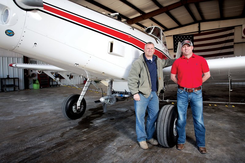 David Freppon, left, and J.P. Freppon are agriculture pilots for Freppon Flying Service in Bald Knob. The brothers grew up working with their father, who is also a pilot, on their farm outside of Bald Knob.
