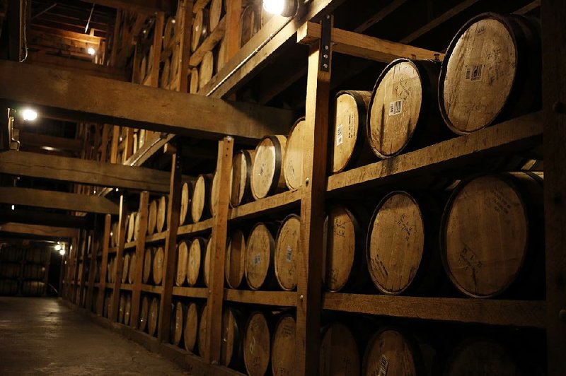 Barrels of Jack Daniel’s Tennessee Whiskey age in a warehouse in January at Jack Daniel’s Distillery in Lynchburg, Tenn. The Tennessee Legislature is considering proposals to ease rules that dictate which producers can call their products “Tennessee whiskey.” 