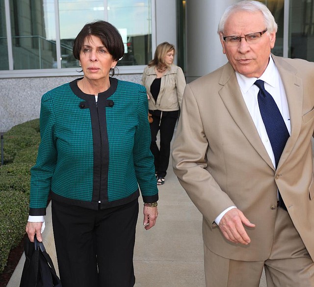 Former state Treasurer Martha Shoffner asked a federal judge to allow her to retain one of her attorneys at the government’s expense. She is shown in this file photo with attorney Chuck Banks.
