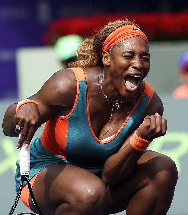 Serena Williams celebrates after scoring a point during her 6-4, 4-6, 6-4 victory over Caroline Garcia of France on Saturday at the Sony Open in Key Biscayne, Fla. 