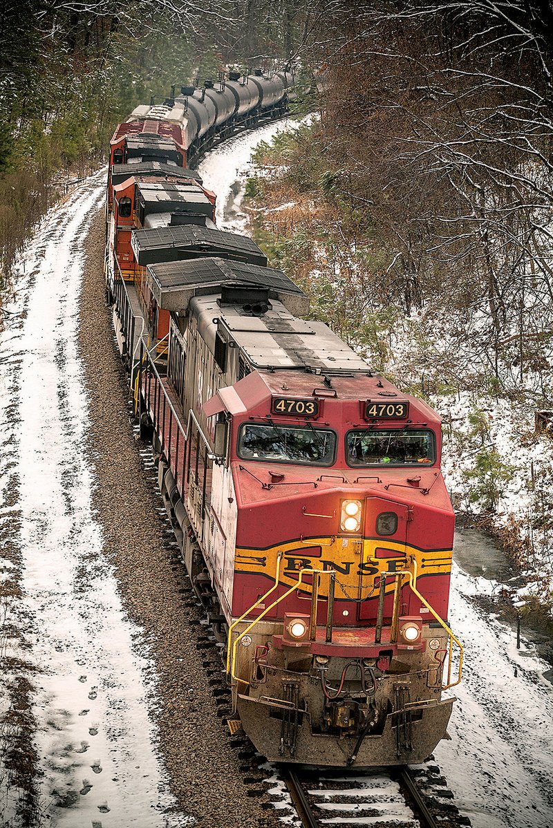 BNSF locomotives pull tank cars along a section of Union Pacific Railroad track in Redfield on Feb. 9. A surge in oil production has producers relying on rail transport to move crude to refineries. 