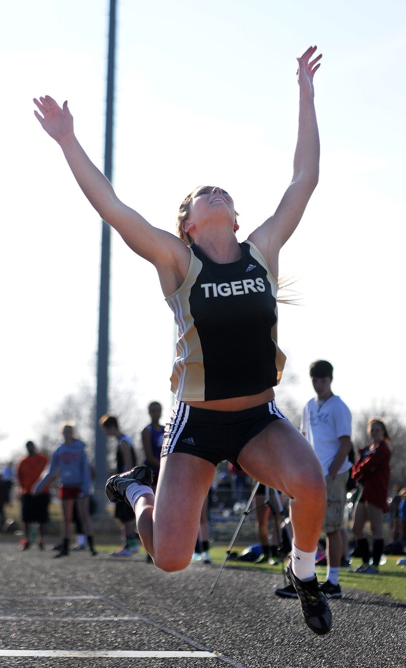 STAFF PHOTO SAMANTHA BAKER 
• @NWASAMANTHA 
Logan Morton of Bentonville competes in the long jump Thursday during the Tiger Relays at Tiger Athletic Complex in Bentonville.