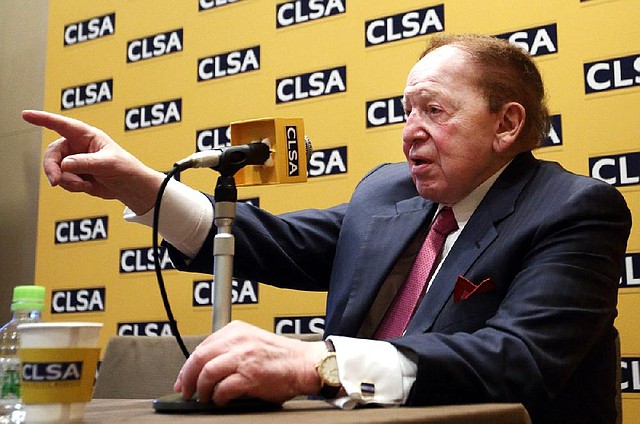 Billionaire Sheldon Adelson, chairman and chief executive officer of Las Vegas Sands Corp., shown at the CLSA Japan Forum in Tokyo on Feb. 24, is expecting to play a big part the 2016 elections by putting his weight and money behind a mainstream Republican with a shot to win the White House. 