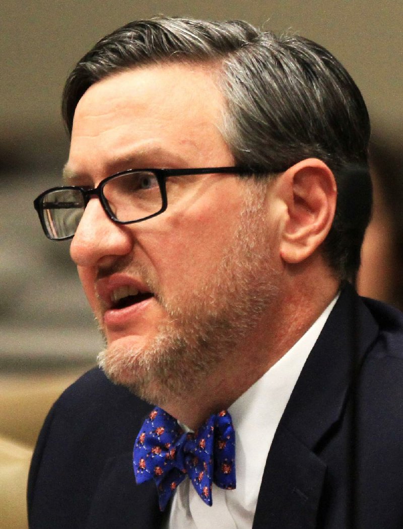 Heath Abshure, director of the Arkansas Securities Commission, is questioned by the Joint Performance Review Committee for exchanging fines for charitable contributions to an organization he leads, in this January 2014 photo.

