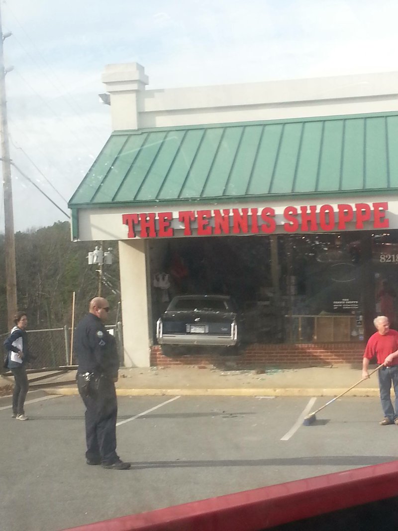 A Cadillac crashed into The Tennis Shoppe at 8218 Cantrell Road in Little Rock on Wednesday afternoon, injuring two employees inside the business.