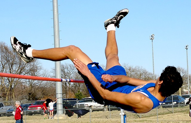 Photo by Mike Eckels Decatur Bulldog high jumper Mario Urquidi sails over the bar during Bentonville Tiger Relays March 20. Urquidi was competing with jumpers for Fayetteville, Springdale, Rogers, Bentonville, Ft. Smith and other area schools from 1A through 7A. He placed 6th in the event.