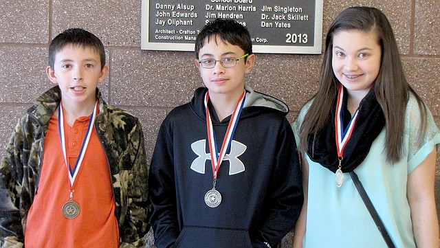 Submitted Photo March Students of the Month at Gravette Middle School are: Hayden Harris, sixth grade; Lewis Fox, seventh grade; and Ebere Miller, eighth grade.
