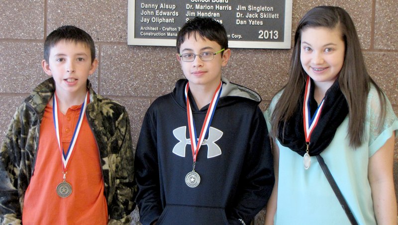 Submitted Photo March Students of the Month at Gravette Middle School are: Hayden Harris, sixth grade; Lewis Fox, seventh grade; and Ebere Miller, eighth grade.