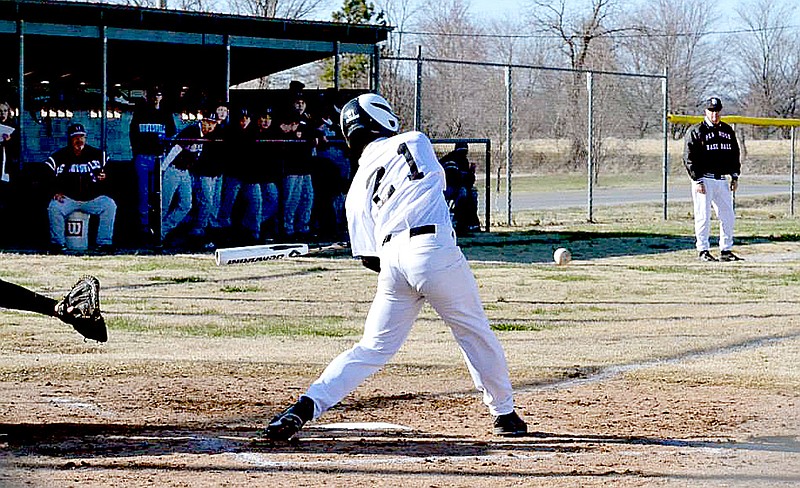 Junior Blackhawk Garrett Easterling, No. 21, is shown batting at the home opening baseball game.