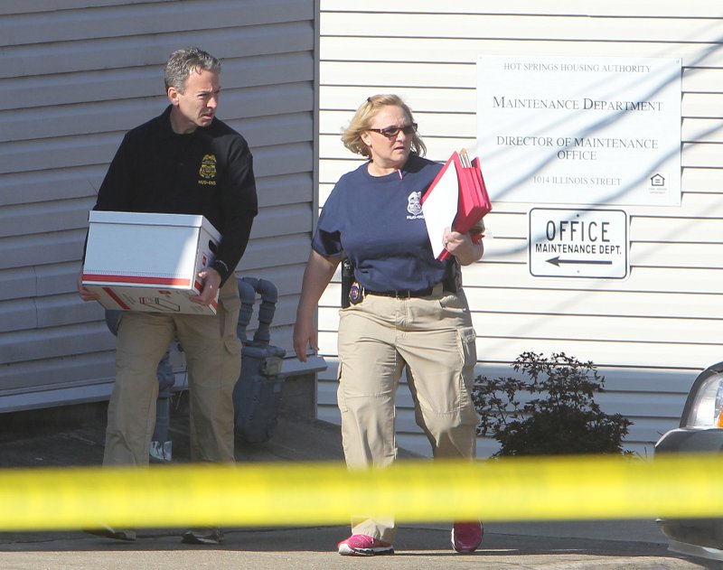 The Sentinel-Record/Richard Rasmussen HUD RAID: U.S. Department of Housing and Urban Development-Office of Inspector General agents removed papers from the Hot Springs Housing Authority Central Officers early Tuesday after executing a search warrant. The agents interviewed employees, and searched offices and vehicles.