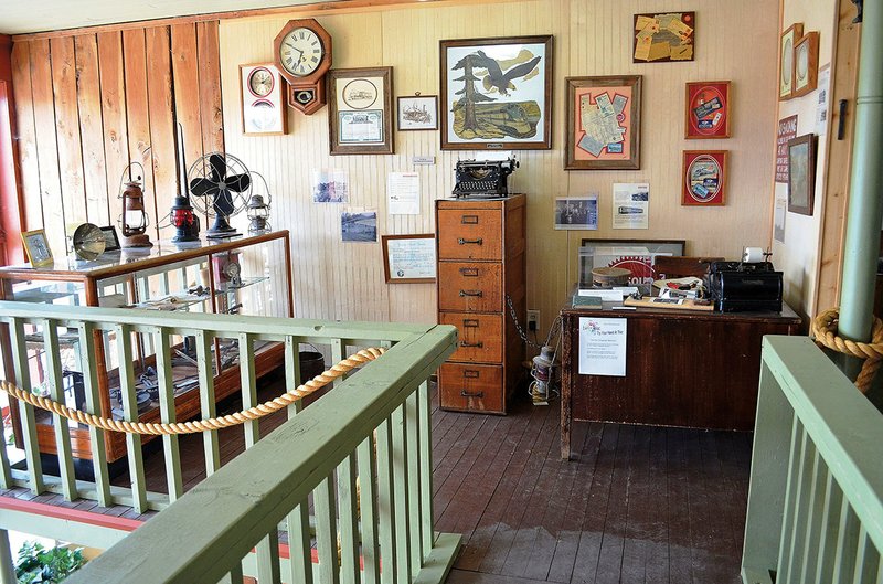 The Calico Rock Museum’s train-depot exhibit is seen from the catwalk that inmates built this year to connect the two sides of the building’s balcony.
