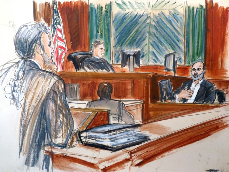 In this courtroom sketch, Osama bin Laden's son-in-law Sulaiman Abu Ghaith, right, testifies at his trial Wednesday, March 19, 2014, in New York, on charges he conspired to kill Americans and aid al-Qaida as a spokesman for the terrorist group. Listening to testimony are Judge Lewis Kaplan, center, and defense attorney Stanley Cohen, at podium. In his surprise testimony, Abu Ghaith recounted the night of the Sept. 11, 2001, attacks, when the al-Qaida leader sent a messenger to drive him into a mountainous area for a meeting inside a cave in Afghanistan. "Did you learn what happened? We are the ones who did it," Abu Ghaith, recalled bin Laden telling him. 