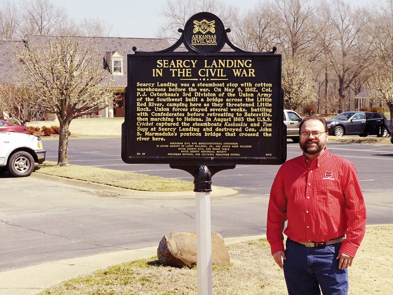Local historian Scott Akridge is shown at the River Oaks Golf Course next to one of six Civil War markers in White County. The markers are part of a program that incorporated private donations and state matching funds to honor people and sites in the county that had a significant impact on the war.