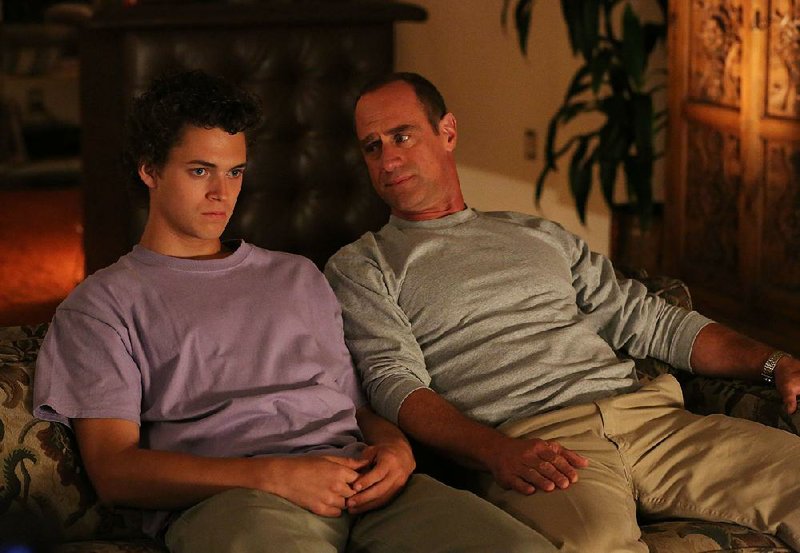 Jack Dunlevy (Christopher Meloni, right) has some manly advice for his son, Frankie (Connor Buckley), on the new Fox sitcom Surviving Jack. The series debuts at 8:30 p.m. today. 