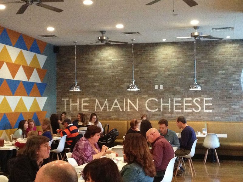 FILE — The dining room of the Main Cheese in west Little Rock.
