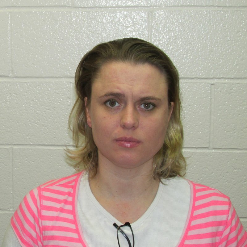 Andrea Lea Davis, 36, of Hot Springs was booked into the Garland County jail March 27, 2014, on charges of manslaughter and use of a communication device in furtherance of a felony.