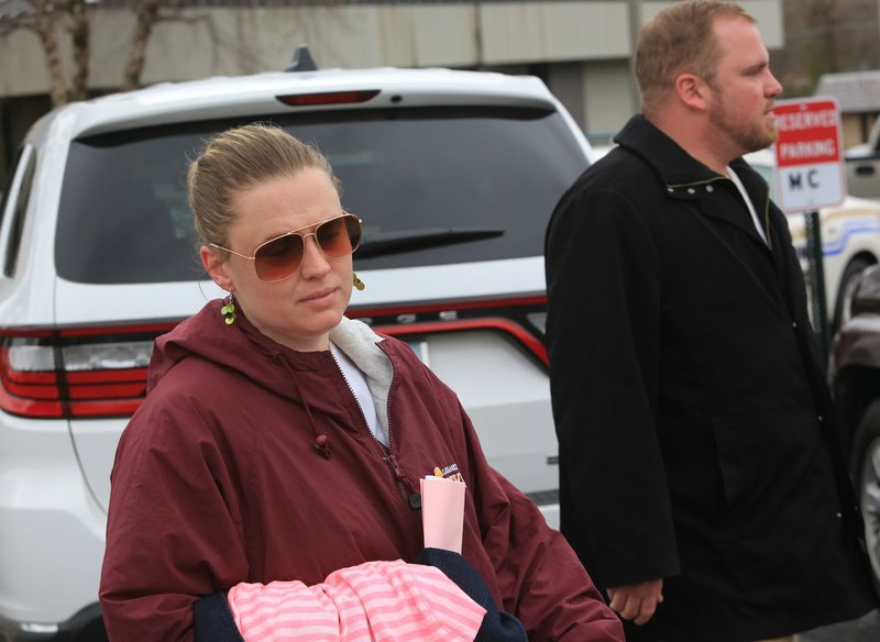 Andrea Davis, 36, and her brother Matthew Davis, 32, leave the Garland County Sheriffs Office after they bonded out in Hot Springs Friday. They were arraigned after being charged with manslaughter in the Feb. 29, 2012 slaying of Maxwell Anderson.