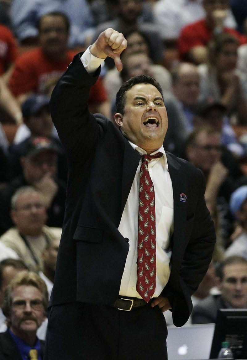 Arizona Coach Sean Miller (shown) and Wisconsin Coach Bo Ryan have deep roots and similar views about basketball. Each hopes to lead a team to the Final Four for the first time. 