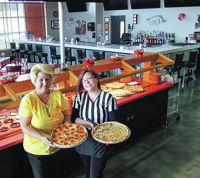The Razorback Pizza &amp; Sportsbar brings a new look and new menu items to Jim&#8217;s Razorback traditional offerings.