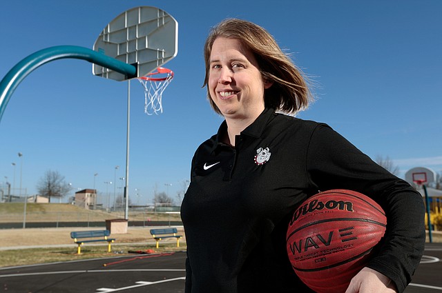 Heather Hunsucker of Springdale is the All-NWA Girls Basketball Coach of the Year.