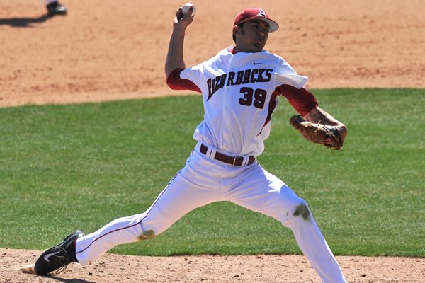 Chris Oliver fires a pitch against Alabama March 23, 2014 at Baum Stadium.