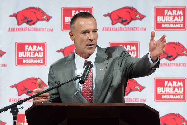 Jimmy Dykes speaks after being introduced as the eighth women's head basketball coach Sunday, March 30, 2014, at Bud Walton Arena in Fayetteville. Dykes left his job as an analyst for ESPN for the position. Dykes coached at Arkansas, Sacramento State, Appalachian State, Kentucky and Arkansas-Little Rock, and Oklahoma State.