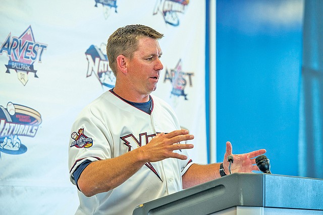 STAFF PHOTO ANTHONY REYES Vance Wilson, Northwest Arkansas Naturals manager, speaks Monday during the Media Day conference at Arvest Ballpark in Springdale. The event was followed by a practice open to the public.