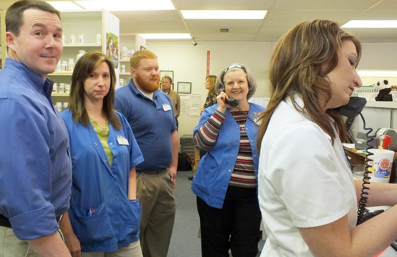 TIMES photograph by Annette Beard Mel Collier, left, owner of Collier&#8217;s Drug stores, met with employees of the Pea Ridge store Wednesday, March 26, as officials from Fred&#8217;s gathered preparing to take possession of the inventory. Employees &#8212; Tina Benson, Kenneth Mudd, Peggy Stone and Sheryl Rose &#8212; continued working until the last minute of the transfer.