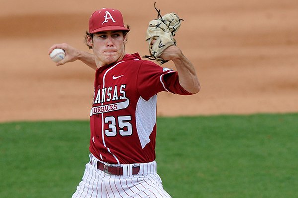 Arkansas' Jackson Lowery delivers a pitch Wednesday, April 2, 2014, during the game against Nebraska at Baum Stadium in Fayetteville.