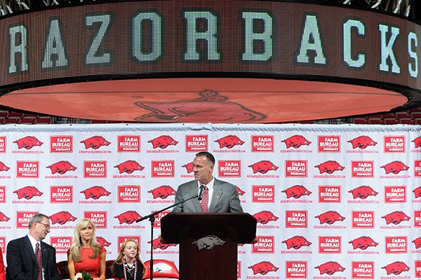 Jimmy Dykes speaks after being introduced as the eighth women's head basketball coach Sunday, March 30, 2014, at Bud Walton Arena in Fayetteville. 