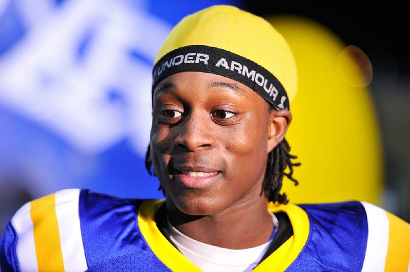 FILE — 1/18/2013 — NLR athlete Altee Tenpenny talks to the media before Friday night's 7A quarter final game in North Little Rock. 