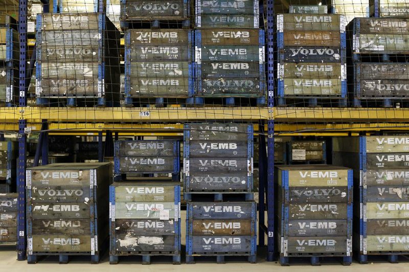 Crates containing engine and transmission parts are stacked on shelves at Volvo Trucks’ powertrain manufacturing facility in Hagerstown, Md., last month. Factory orders rose 1.6 percent in February, the Commerce Department said. 