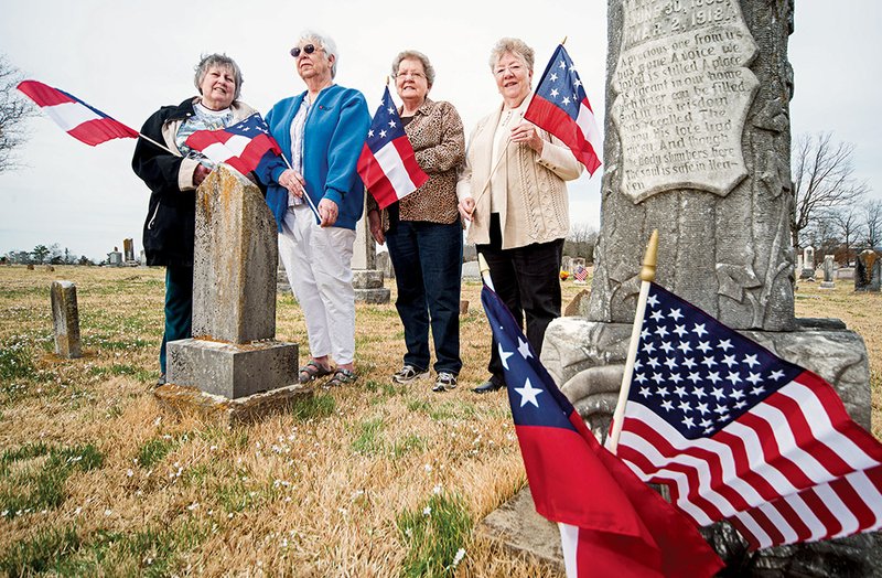 Diane Hall, from left, Alice George, Carolyn Johnson and Dorothy Ball are among the members of the United Daughters of the Confederacy Chapter in Cleburne County who marked the graves of Civil War veterans with flags in honor of Confederate Memorial Day, which is April 26.