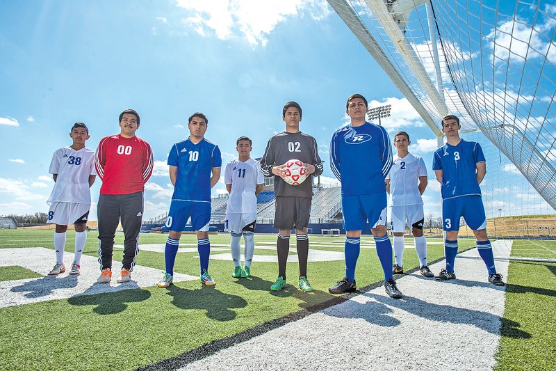  STAFF PHOTO ANTHONY REYES Freshman Alex Balderas, from left, of Rogers High School, junior Ruben Balderas (00), senior Daniel Rivera (10), freshman Cobi Rivera (11), freshman Alberto Rios (2), senior Alexander Rios, freshman Alex Valdez (2), and junior Wilson Valdez (3) are all brothers who play on the school&#8217;s soccer team.