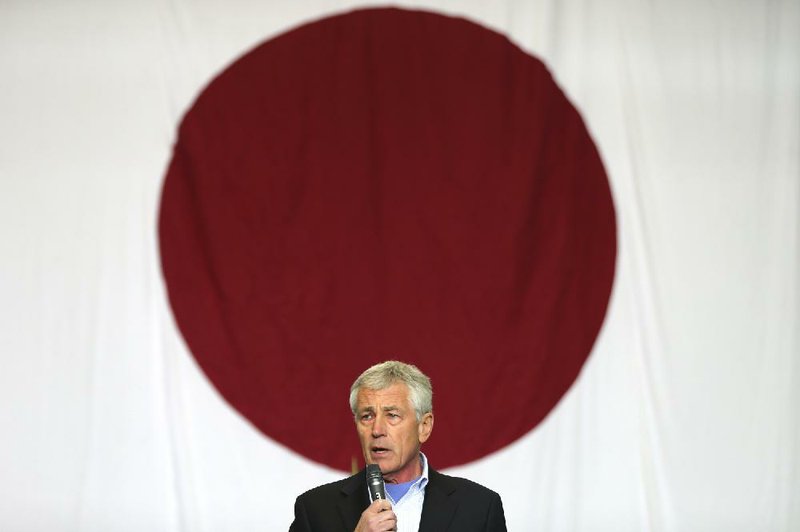 Defense Secretary Chuck Hagel, speaking Saturday at the U.S. Yokota Air Base outside Tokyo, said the United States is serious about its treaty obligations to Japan. 