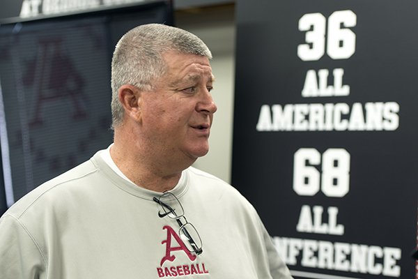 Dave Jorn, pitching coach at the University of Arkansas, talks with the media Friday, Feb. 7, 2014 at the University of Arkansas baseball media day at Baum Stadium in Fayetteville.