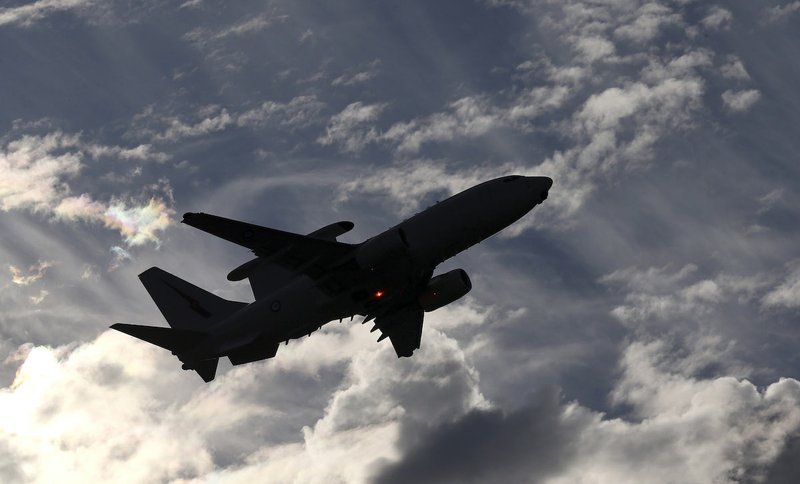 A Royal Australian Air Force E-7A Wedgetail takes off from Perth Airport on route to conduct search operations for missing Malaysia Airlines Flight MH370 in southern Indian Ocean, near the coast of Western Australia, Saturday, April 5, 2014. 