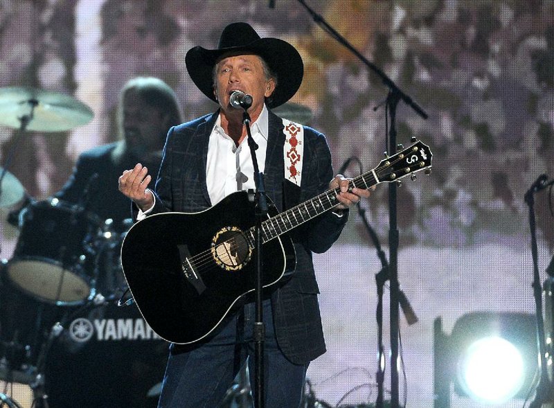 George Strait performs on stage at the 49th annual Academy of Country Music Awards at the MGM Grand Garden Arena on Sunday, April 6, 2014, in Las Vegas. (Photo by Chris Pizzello/Invision/AP)