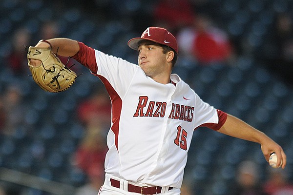 Arkansas starter Colin Poche delivers a pitch during the fourth inning against Nebraska Tuesday, April 1, 2014, at Baum Stadium in Fayetteville.