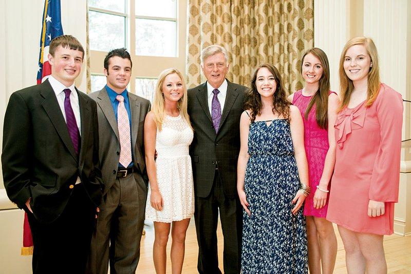 Fountain Lake seniors Eli Westerman, from left, and Matt Pultz pose for a photo along with Gavin Stiles, Gov. Mike Beebe, Brooke Hobbs, Erin Halley and Lindsey Savall. The women are all seniors at Jessieville High School. These students maintained a 4.0 GPA through high school and were among the scholars recognized by Altrusa International of Hot Springs Village with a luncheon at the Governor’s Mansion. Students from Jessieville, Mountain Pine and Fountain Lake who had a 4.0 GPA in the fall semester were honored at Wednesday’s event.